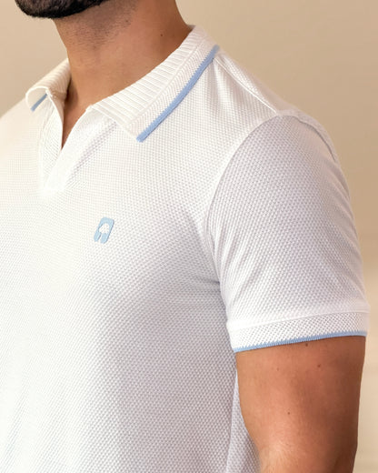 Polo textura Marfil  con cuello y puños Jacquard diseño— Ceiba